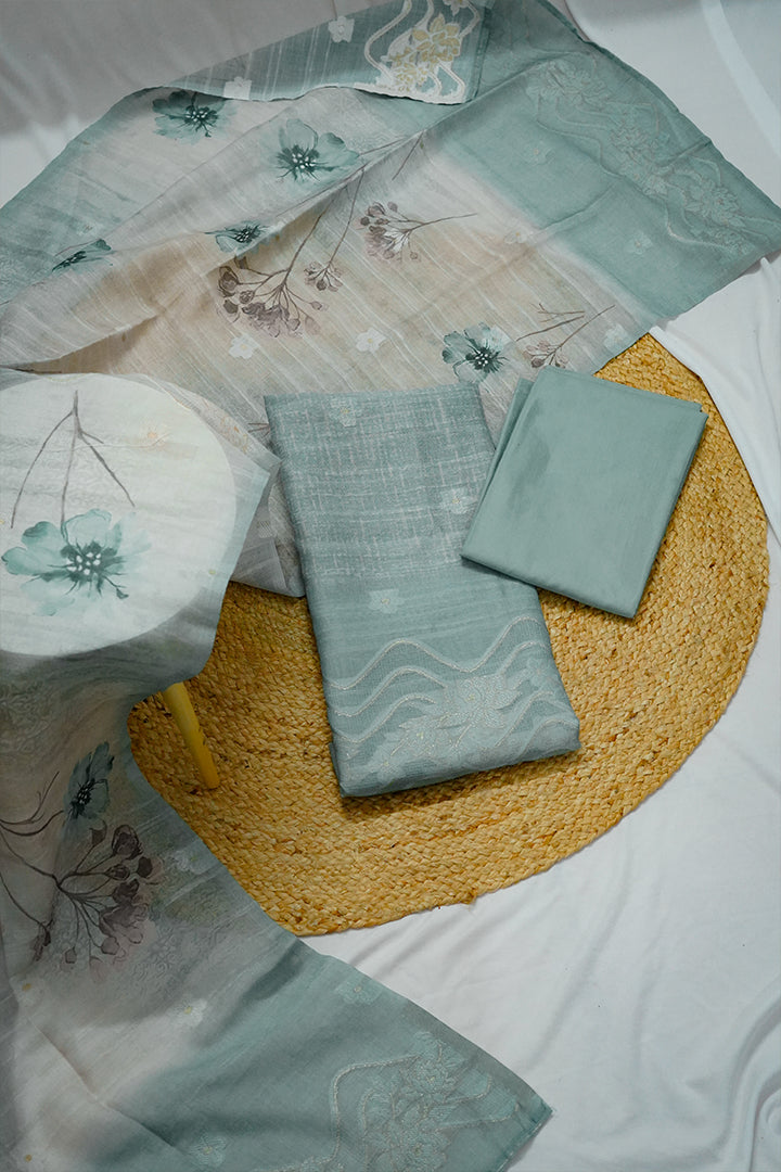 Light green unstitched cotton salwar suit for women featuring elegant floral printed dupatta and plain salwar fabric. Perfect unstitched salwar suit dress material for casual or festive wear. Explore premium unstitched cotton salwar suits with dupatta and buy unstitched salwar suits online in Kerala and Kottayam.